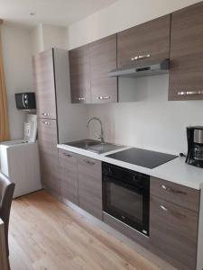 Kuchyňa alebo kuchynka v ubytovaní Logement entier - Appartement
