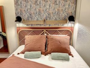 Postel nebo postele na pokoji v ubytování Festival de palmiers, Plages-Congrès, Cocon de Calme au Cœur de Cannes