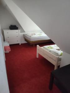 Voodi või voodid majutusasutuse Lucerna toas