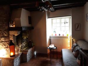 Posezení v ubytování Ste ENIMIE GITE terrasse privative vue imprenable