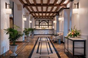 a rendering of a lobby with plants and a ceiling at The Vinoy Resort & Golf Club, Autograph Collection in St. Petersburg