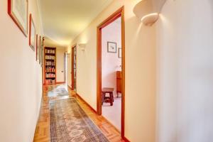 a hallway with a large mirror in a house at Villa Luce-Casa vacanza con vista panoramica mare. in Velletri