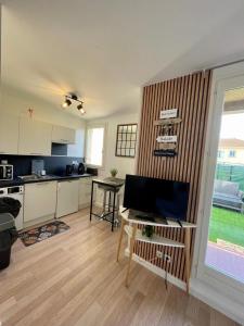 Η κουζίνα ή μικρή κουζίνα στο Studio Moana avec parking et jardin +3 φωτογραφίες