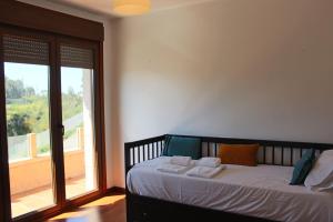 Posteľ alebo postele v izbe v ubytovaní Sensacional Casa en Gondomar + 36 fotografií