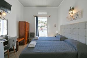 Postel nebo postele na pokoji v ubytování Delfini Hotel + 37 fotografií