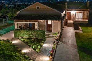 A garden outside STUDIO SPYROS