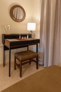 A bed or beds in a room at STUDIO SPYROS