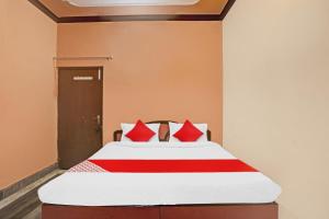 Voodi või voodid majutusasutuse Vj Hotel toas