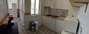 A kitchen or kitchenette at Precioso alojamiento junto al Mediterráneo