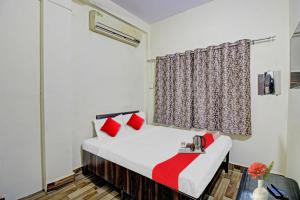 Ένα ή περισσότερα κρεβάτια σε δωμάτιο στο Hotel O Mr +20 φωτογραφίες