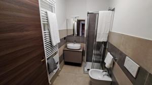 Kúpeľňa v ubytovaní Domus Acaja + 11 fotografií