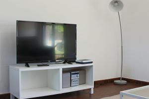 Televízia a/alebo spoločenská miestnosť v ubytovaní Sensacional Casa en Gondomar