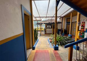 an outside view of a building with a roof at Hostal Ciudad de Segorbe in Salento