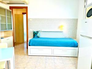 Postel nebo postele na pokoji v ubytování Residence Frontemare