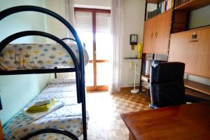 A bed or beds in a room at Affittacamere Umberto&Marisa