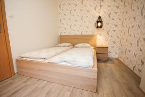 Voodi või voodid majutusasutuse Apartamenty Przy Świerku toas
