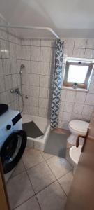 Koupelna v ubytování Apartment Lorena