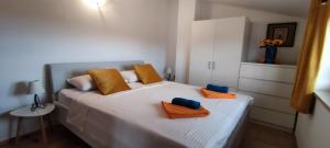 Postel nebo postele na pokoji v ubytování Apartment Lorena