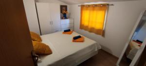 Postel nebo postele na pokoji v ubytování Apartment Lorena