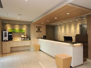 The lobby or reception area at Smile Hotel Shinagawasengakujiekimae