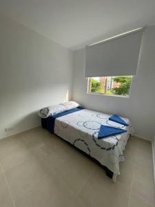 Posteľ alebo postele v izbe v ubytovaní Hermoso Apartamento, piso 2 Valle del Lili.