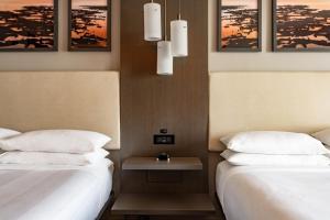 Postel nebo postele na pokoji v ubytování Fort Lauderdale Marriott Coral Springs Hotel & Convention Center + 57 fotografií