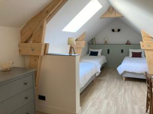 Posteľ alebo postele v izbe v ubytovaní Maison Chemin, chambres d'hôtes à Amboise
