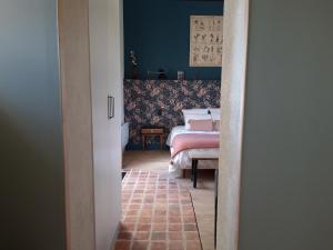 Posteľ alebo postele v izbe v ubytovaní Maison Chemin, chambres d'hôtes à Amboise