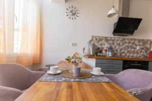 A kitchen or kitchenette at La Corte dei Bohem