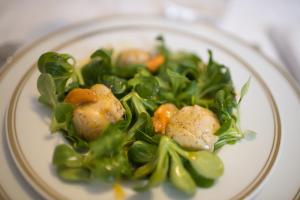 a plate of food with broccoli and other vegetables at Aux Charmes de Maintenon in Maintenon