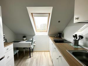 Foto dalla galleria di Pokoje na Jasełkowej a Stettino Altre 45 foto