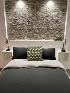 Postel nebo postele na pokoji v ubytování CUEVAS DEL PEÑÓN - Loft Torreón
