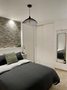Postel nebo postele na pokoji v ubytování CUEVAS DEL PEÑÓN - Loft Torreón