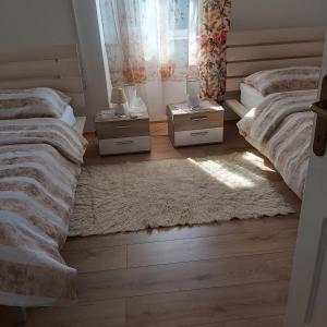 Posteľ alebo postele v izbe v ubytovaní Apartman Fiume