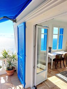 a house with a view of the ocean at Sea view studio terrasse Cap Martin/Monaco in Roquebrune-Cap-Martin