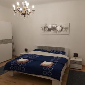Posteľ alebo postele v izbe v ubytovaní Apartman Fiume