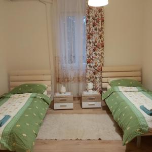 Posteľ alebo postele v izbe v ubytovaní Apartman Fiume