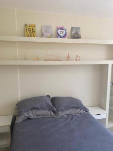 Krevet ili kreveti u jedinici u objektu Lindo apartamento de 1 quarto no SUDOESTE