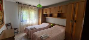 Postel nebo postele na pokoji v ubytování Villa Teresa