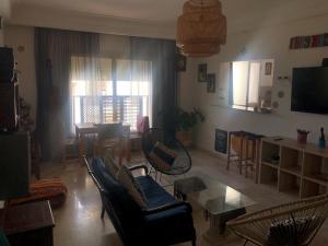 Appartement de Charme Avec Vue Sur Mer電視和／或娛樂中心