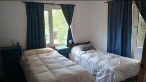 Ένα ή περισσότερα κρεβάτια σε δωμάτιο στο Casa Verde