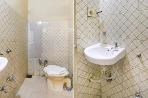 a bathroom with a sink and a toilet at SPOT ON Hotel Super Guest House in Ahmedabad