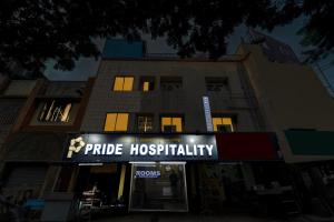 a building with a sign that reads pride hospitality at Collection O Pride Hospitality US Consulate in Chennai