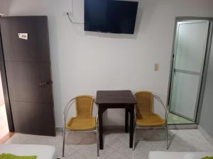 TV a/nebo společenská místnost v ubytování Hotel El Deportista