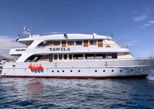 a large white yacht sitting in the water at Tawil 2 in Sharm El Sheikh