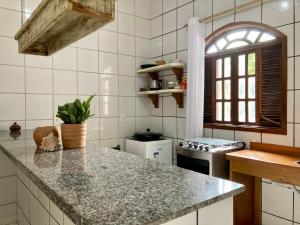 Una cocina o zona de cocina en Apartamento Center Braga