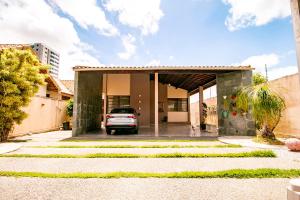 a car parked in the garage of a house at Casa em Campina Grande in Campina Grande