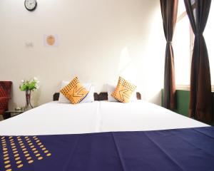 Un ou plusieurs lits dans un hébergement de l'établissement Flagship Ranthambore Holiday Inn