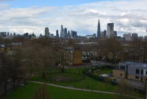 a view of a city skyline with a park at Elkington Point in London