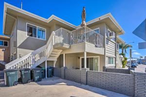a house with a statue on top of it at Newport Beach Vacation Rental - Short Walk to Pier in Newport Beach